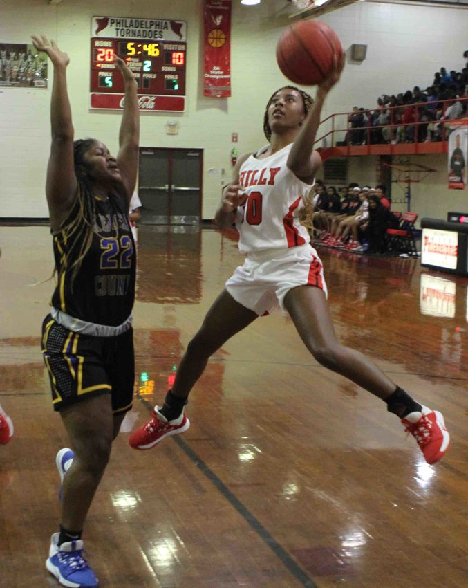 Philadelphia’s Nia Luckett drives to the basket against Kemper County on Friday night.