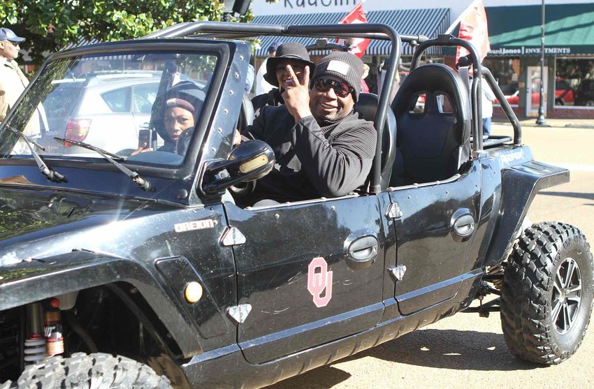 Marcus Dupree rides in his Oklahoma cruiser on Monday in the MLK parade.