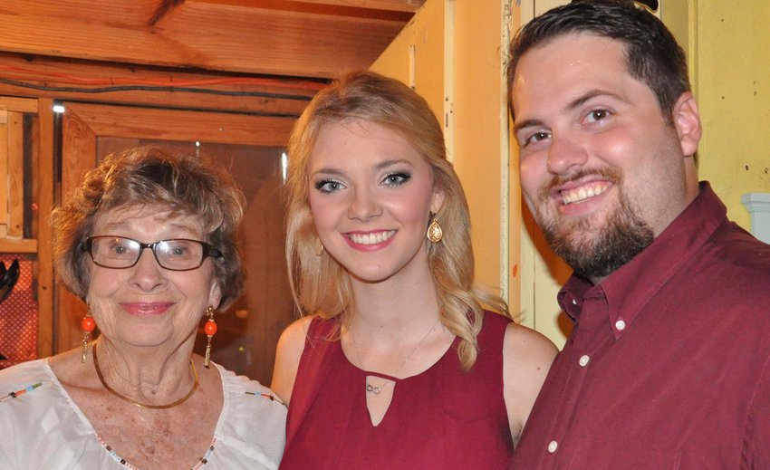 Longtime Democrat society columnist Rachel Darby Evans, left, at the 2016 Fair with her grandson Dan and Kate Jones, who would go on to become Mrs. Evans.