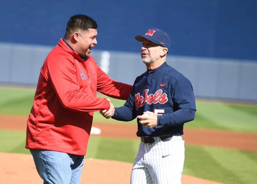 Mississippi Band of Choctaw Indians Tribal Chief Cyrus Ben shakes hands with Ole Miss Head Baseball Coach Mike Bianco after throwing the ceremonial first pitch last weekend in Oxford.