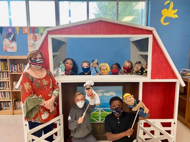 Rachel Kiepe is pictured with her students at the puppet barn in the Philadelphia Elementary School Library. Joining Kiepe are, from left, Katilynn Gray, Conner Robertson, Carly Beth Richardson, Macie Spurlock, Khordez Finley and Carlisle Ray.