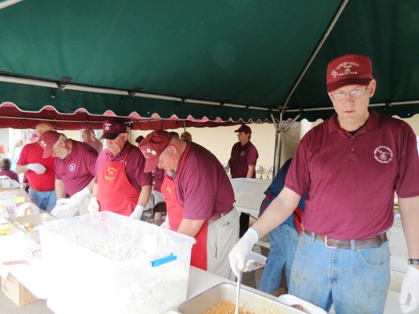 The Neshoba County Shrine Club held its annual BBQ chicken plate sale on Nov. 7. Pictured left to right are: Richard Whitehead, Mitchell McDonald, Grover Vining, John Stewart (background) Dean Bivatea and Robert Hodgins.