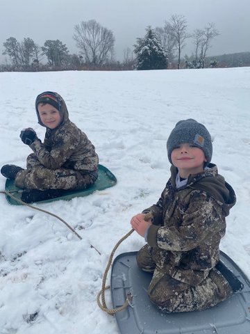 Caden and Jennings Brown enjoying the snow in Linwood.