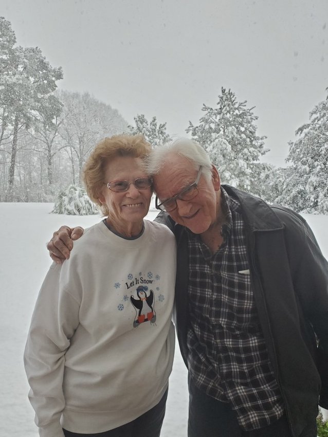 Leslie Fulton sent this in. She says Frank and Peggy Staton from Alturas, Florida, got an unexpected surprise while visiting their "Northbend" family. Frank said it has been about 60 years since they have seen snow!