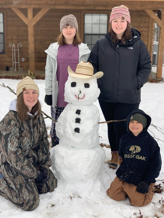 Harlee Grace, Sara, Allison, and Garrett Neese enjoying their Snow Day in the Sandtown community!