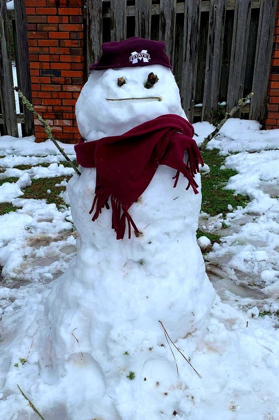 The Richie Rea family built an MSU snowman on Edgewater.