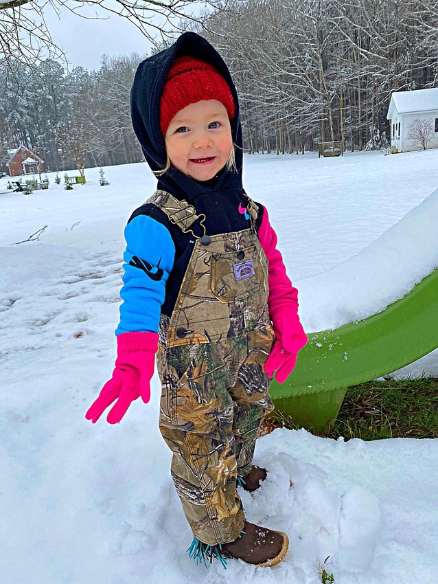 Sawyer Kate's first snow day in McKee subdivision.