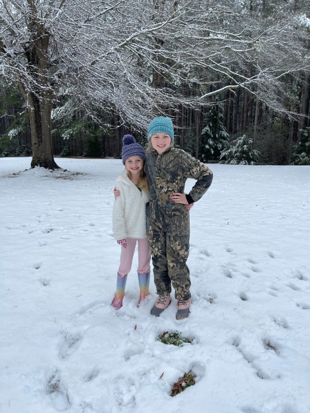 Jacy Blair Alford and Addy Alford in the snow.