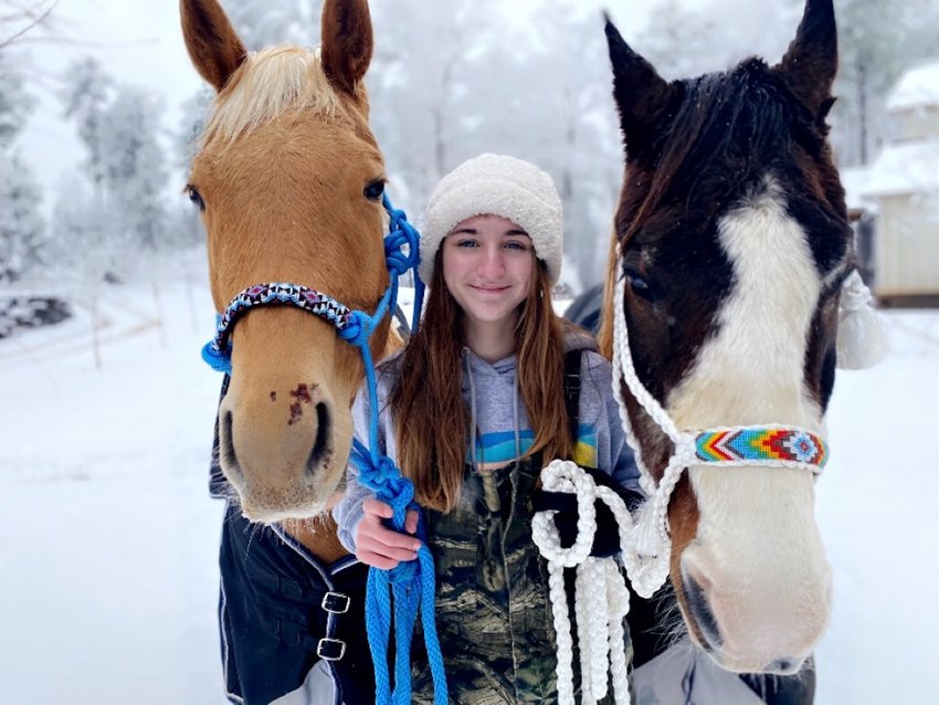 Mary Kate Gray and her horses, Brother and Chex, enjoying the 2021 snow day!