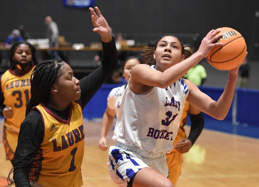Neshoba Central's Aaliyah Tahawah (21) drives to the basket against Laurel at the MHSAA State Basketball Tournament  semifinals on Tuesday, March 2, 2021, at the Mississippi Coliseum in Jackson, Miss.