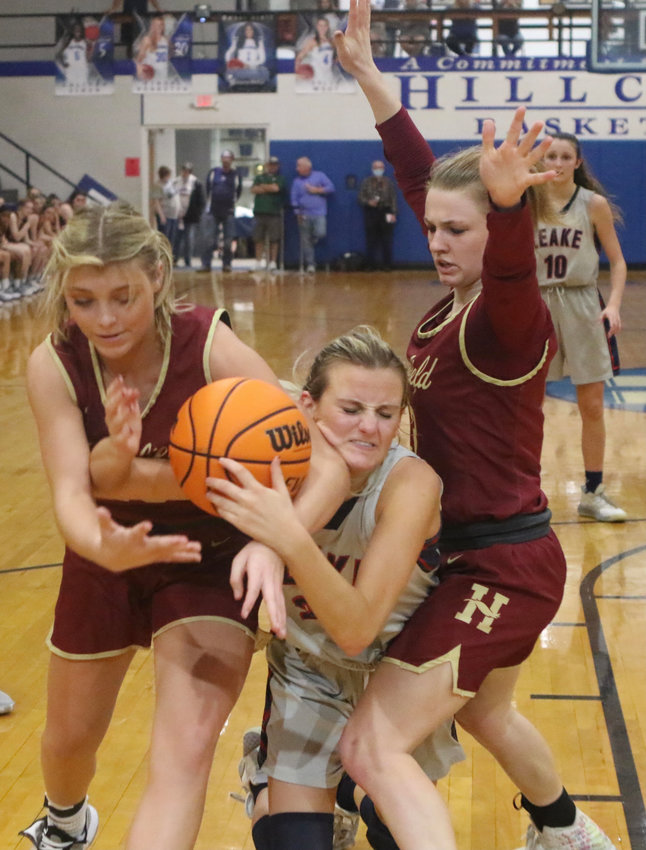 Leake Academy’s Mabry Mayfield goes after a loose ball on Saturday against Hartfield Academy.