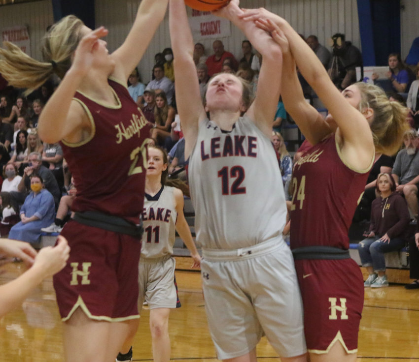 Leake Academy’s Emeri Warren is fouled as she goes up for a shot against Hartfield Academy on Saturday.