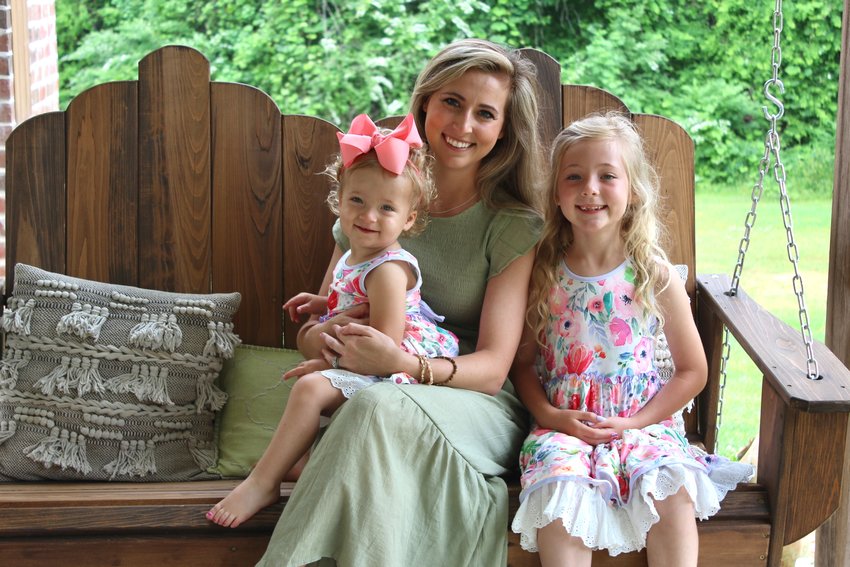 Brittany Lovern King, center, with daughters Madalynn, right, and Landree, left.