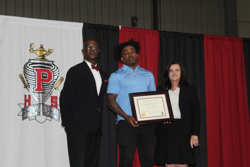 Kadarius Calloway, center, one of two top senior athletes, pictured with Principal Steve Eiland and Superintendent Dr. Lisa Hull.