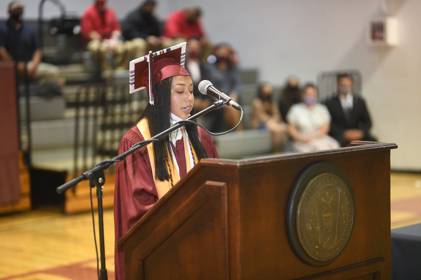 Choctaw Central High School Valedictorian Sierra Wallace delivers a speech to fellow students inside the Choctaw Central gymnasium last Tuesday as rainy conditions forced the ceremony to be moved indoors. Wallace is the daughter of Scottie and Millicent Wallace, and she likened her speech to a cross-country race.