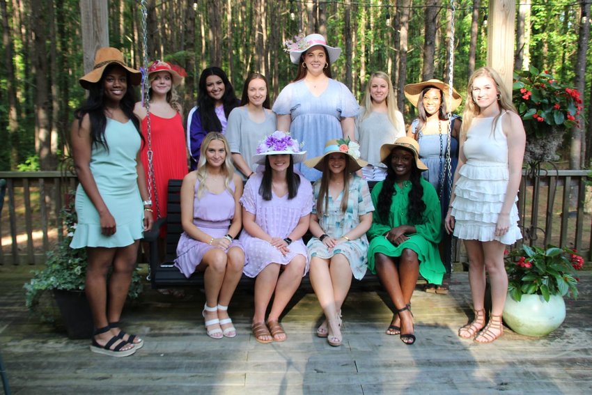 The invitation read “Join us for a Porch Party at Gigi’s honoring Emma Taylor & Mary Kate Moran on Saturday, May 15 at 4:00.” Guests were asked to wear their favorite decorated hats for a hat contest.