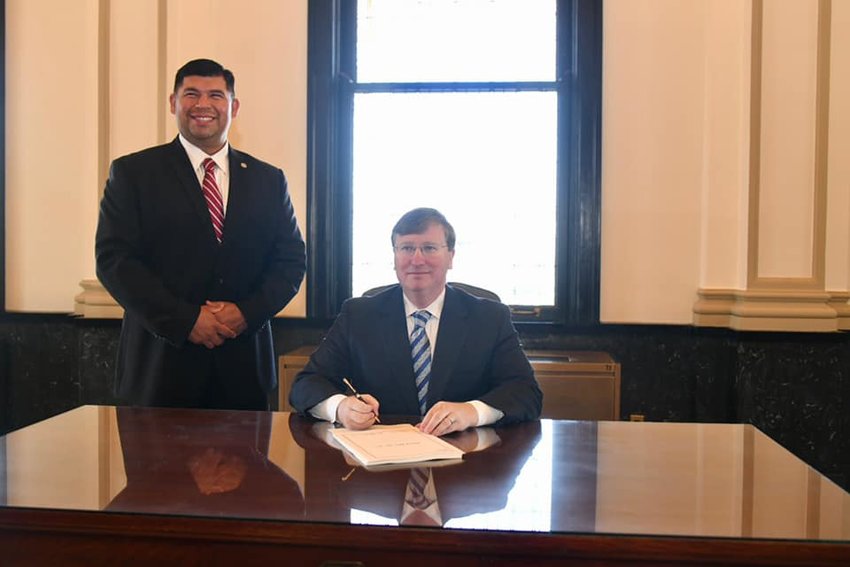 Tribal Chief Cyrus Ben traveled to Jackson on Thursday, May 6, to witness the ceremonial signing of House Bill 277 by Gov. Tate Reeves in his Capitol office. 