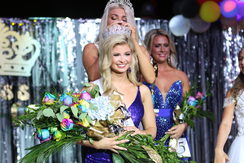 Abby Seale is crowned Miss Neshoba County Fair 2021 by Miss Neshoba County Fair 2019 Olivia Delaney Adams.