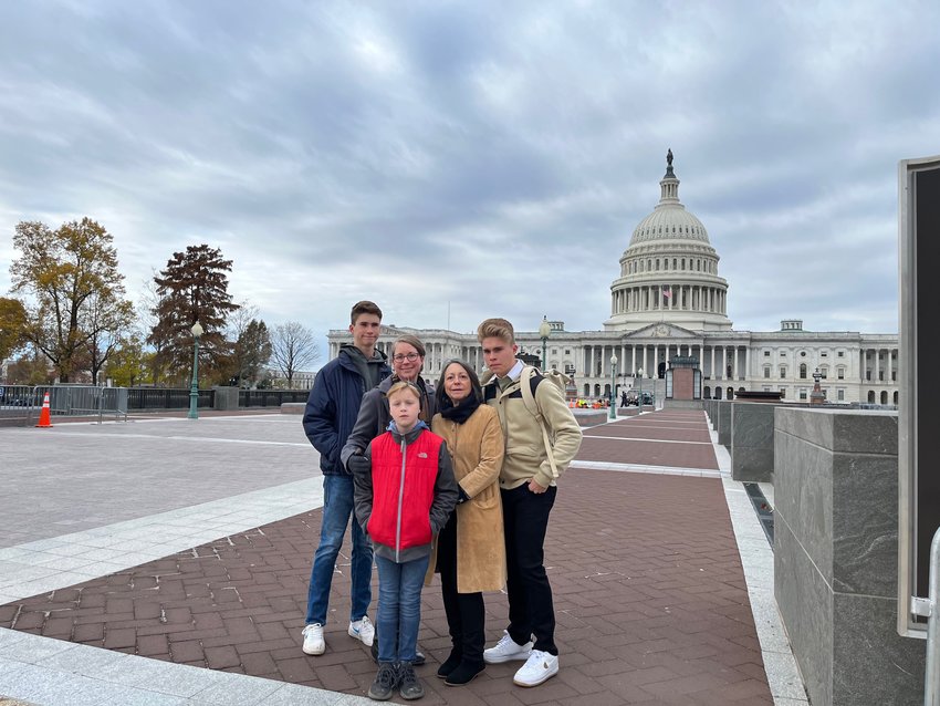 State Sen. Jenifer Branning, second from left, stands outside the U.S. Capitol in Washington on Tuesday in advance of the historic Supreme Court hearing today in a Mississippi case that could overturn Roe v. Wade. Pictured with Branning, from left, are sons Ellis Branning, Evan Branning, mother Ruth Ann Barrage, and son Ethan Branning. Husband Chancy Branning was the photographer.