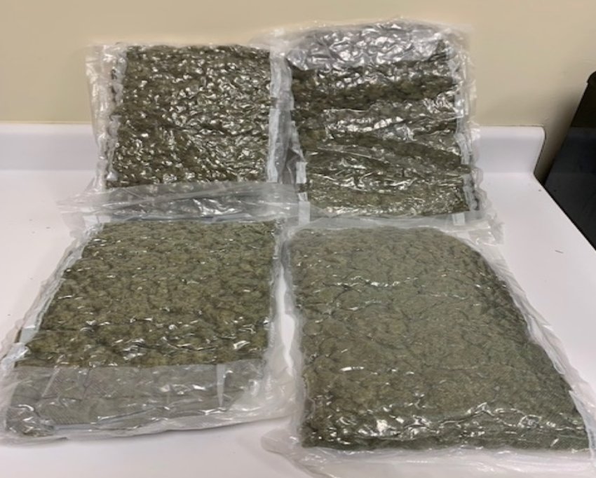 A search warrant executed on Pecan Avenue on Thursday before lunch produced one arrest and about $25,000 worth of marijuana in vacuum-sealed bags in a multi-agency investigation with more charges anticipated, Sheriff Eric Clark said.