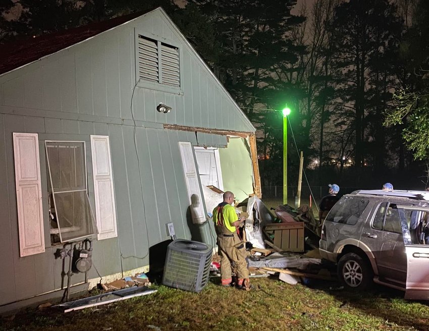 A boy working on his computer was thrown from his room and seriously injured after a vehicle police were chasing slammed into his home at the south end of Poplar Avenue Wednesday evening and went through the house, his family said.