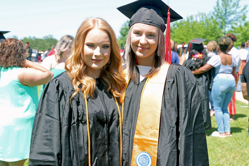 Katie Simmons and Millie Holley, both from Neshoba Central, after EMCC’s graduation on the Scooba campus on May 6.