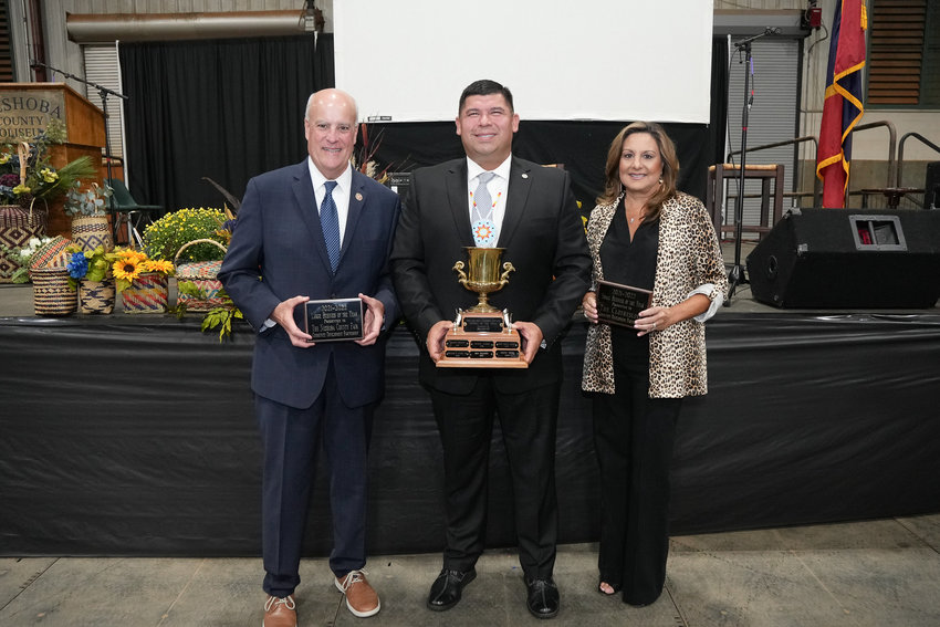 The Neshoba County Fair was awarded Large Business of the Year during the Community Development Partnership Annual Banquet Monday night. Accepting the award is NCF President C. Scott Bounds, left.
Citizen of the Year was awarded to Tribal Chief Cyrus Ben, middle, and
Small Business of the Year was awarded to The Clothesline. Owner Tammy Lee, right, accepted the award.