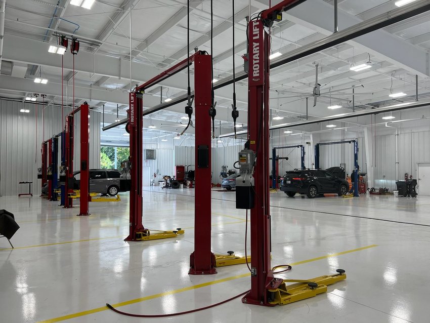 The new dealership has a large number of service bays to service vehicles.