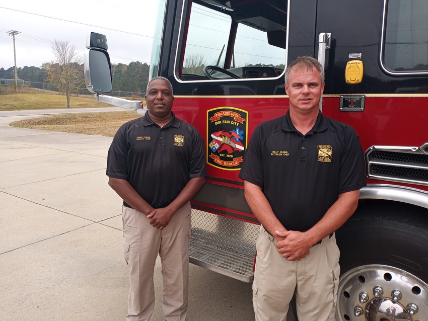 Deric Horne, left, was recently promoted from deputy fire chief to fire chief. Bill Chunn, right, was promoted to deputy chief.