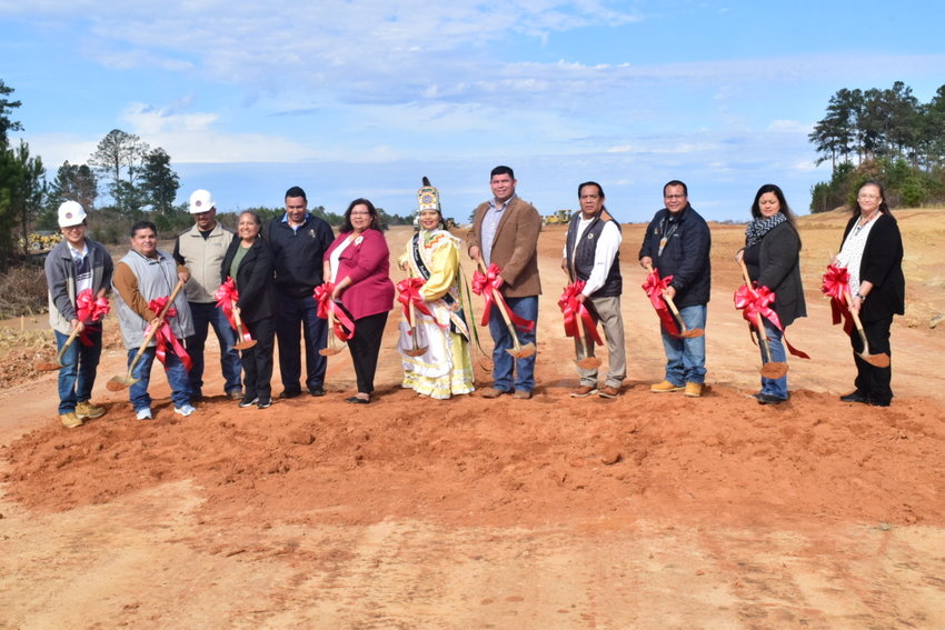 Pictured, from left to right, MBCI Construction Management officials Cameron Jenkins, Eddie Sam, and Terrence Kinsolving; Choctaw Loan Program Director Darlene Willis; Tucker Tribal Council members Demando Mingo and Wilma Simpson-McMillan; 2022-2023 Choctaw Indian Princess Cadence Raine Nickey; Tribal Chief Cyrus Ben; Bogue Chitto Tribal Council member and Vice-Chief Ronnie Henry, Sr.; Bogue Chitto Tribal Council members Kendall Wallace and Angela Hundley; and MBCI Development Division Director Sarah Medlock.