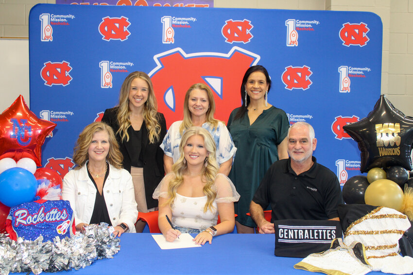 Pictured, seated from left, are her mother, Tena Stovall, Maggie Stovall and her father, Steve Stovall (Back) Dance Team Choreographer Bridget Kelly, Head Coach Angie Bobo and Assistant Coach Shannon Posey.
