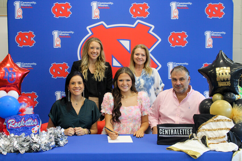 Pictured, seated from left are, her mother, Shannon Posey, Lauren Gwen Posey and her father, Pepper Posey (Back) Dance Team Choreographer Bridget Kelly and Head Coach Angie Bobo