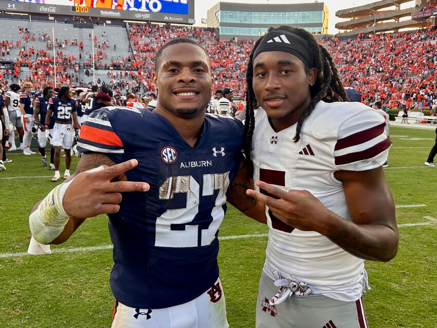 Former Neshoba Central running back Jarquez Hunter and former Philadelphia wide receiver Tulu Griffin pose for a photo following the Auburn-Mississippi State game this past Saturday at Auburn.