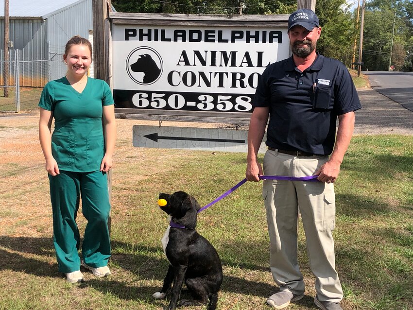 Courtney Stephens and Arthur Breakfield, shelter supervisor, are ready to help residents adopt an animal.