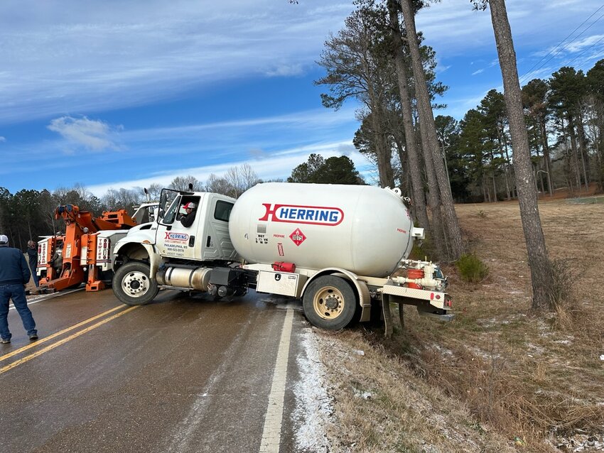 A Herring propane truck slid off Highway 19 North last week due to icy conditions.