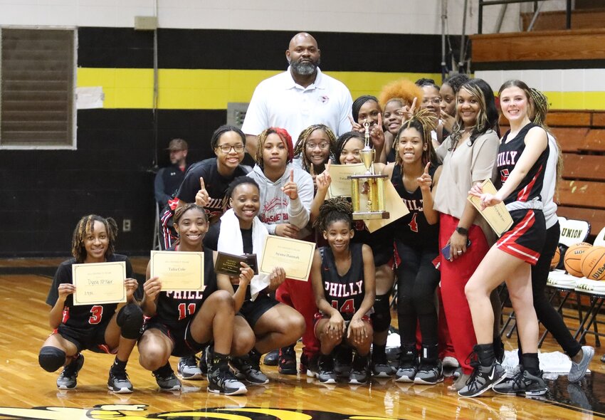 The Lady Tornadoes celebrate a District Championship.